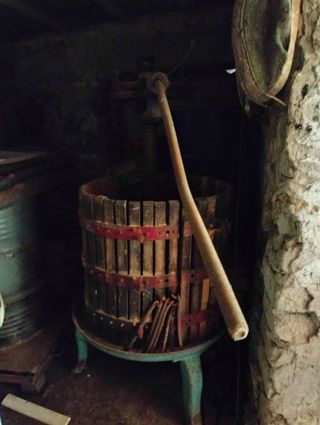 Torchio in legno antico