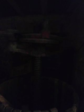 Torchio in legno antico