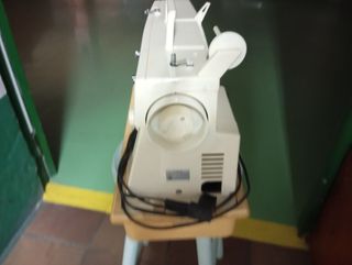 Máquina de coser, necesita poner a punto.
