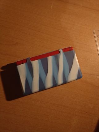 Nintendo DS Lite roja y azul + Cargador