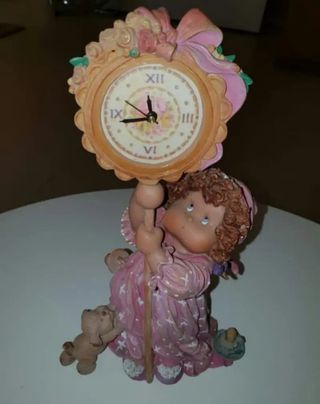 Figura reloj Cuqui