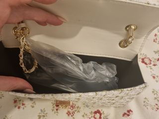 Borsa bianca e oro