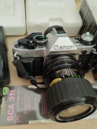 Cámara Canon AE-1 + Flash Sigma
