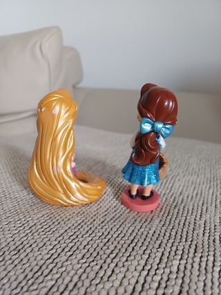 2 Figuras Rapunzel y Bella Disney animators.