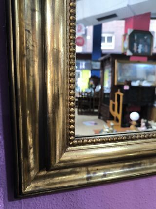 Espejo dorado antiguo