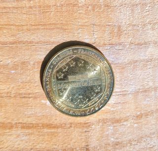 Moneda Michelin Bibendum