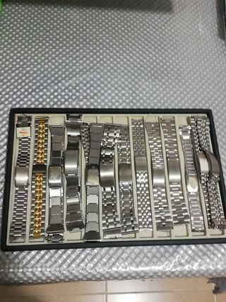 12 Pulseras reloj metal y acero inoxidable.