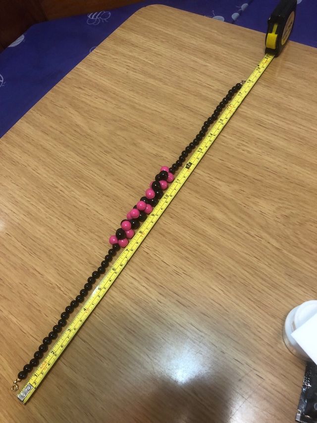 Collar bolas negras y rosas