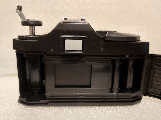 Cosina C2 + 50mm + 28-80mm + box + manuale