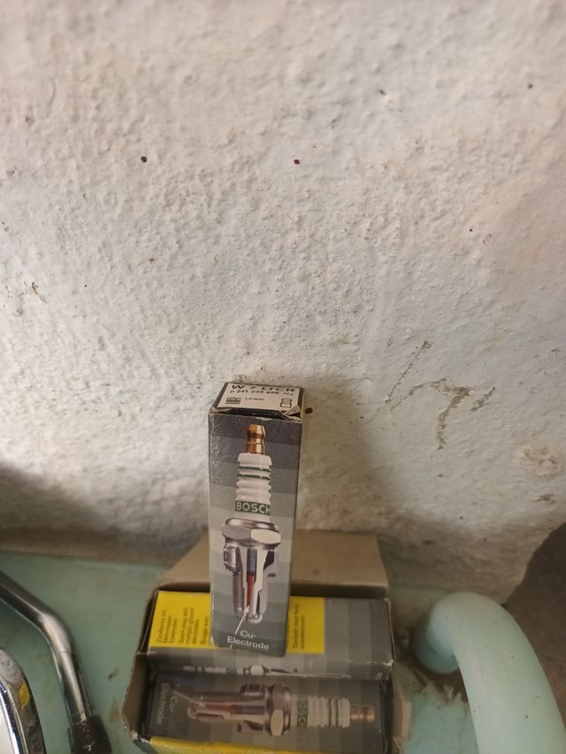 2 Retrovisores clásicos y 7 bujias