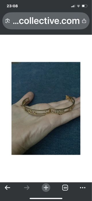 Pulsera Carolina Herrera dorada