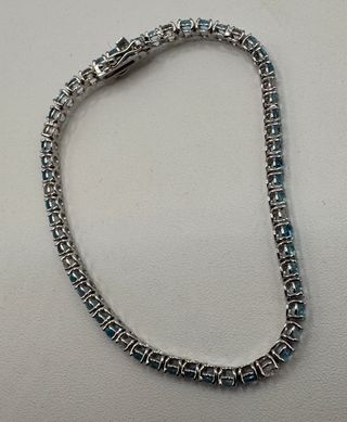 Pulsera riviere de oro 18 kt topacios y diamantes
