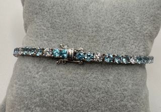 Pulsera riviere de oro 18 kt topacios y diamantes