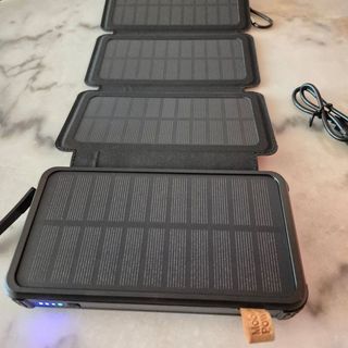 Cargador solar 20000mah 4 paneles y linterna NUEVO
