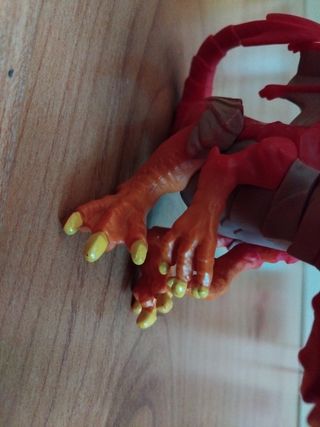 Dinosaurio de dedo: Juguete dragón rojo