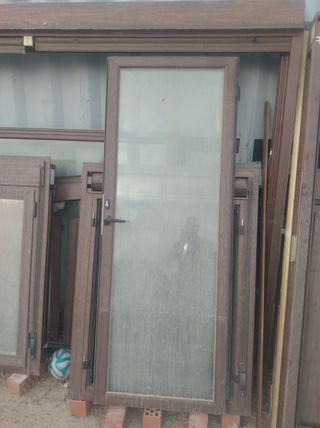 Ventanas aluminio marrón oscuro cristal climalit