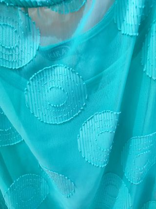 Blusa turquesa estampada