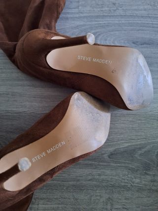 Botas altas ante marrón