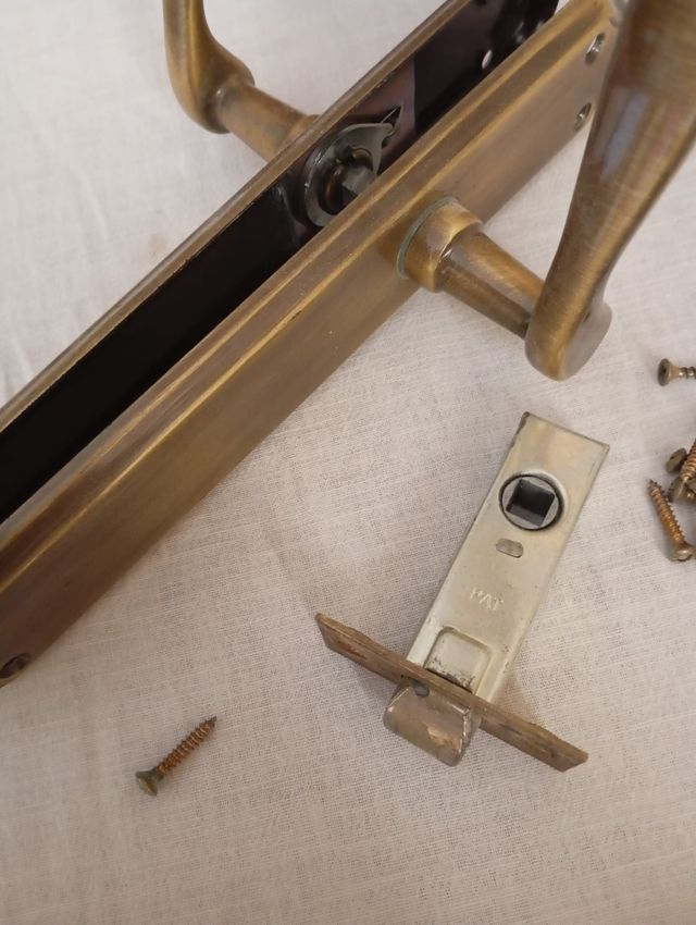 Manilla puerta bronce antiguo