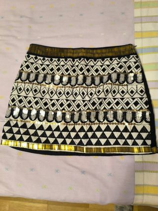 Falda Stradivarius negra y dorada, talla 34