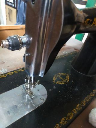 Maquina de coser antigua alfa