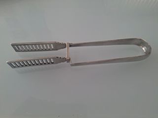 Esparraguera antigua de alpaca.