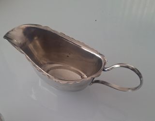 Esparraguera antigua de alpaca.