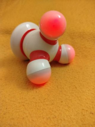 Mini massaggiatore batteria rosso e bianco