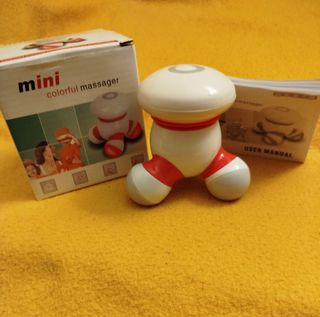 Mini massaggiatore batteria rosso e bianco