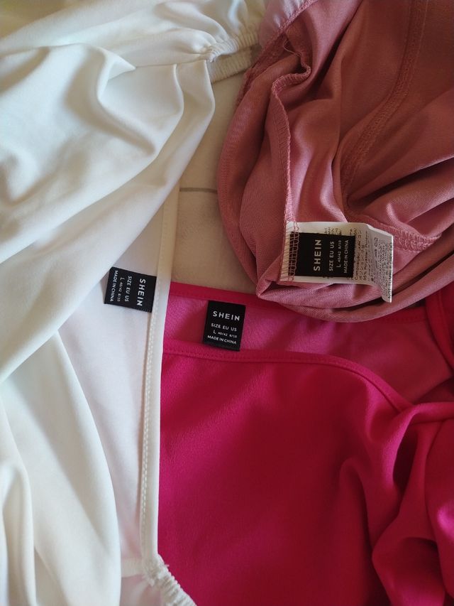 Lote 2 bodys rosa y blanco