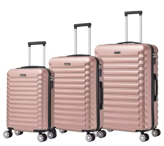 Imposta 3 valigie. Colore rosa metallizzato. Ultimo pack