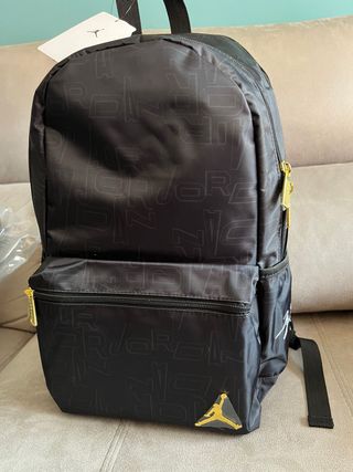 Mochila nike air Jordan negra dorada