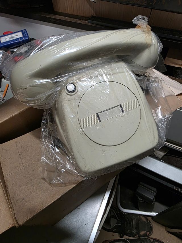 Receptor de telefone, antiga recepcionista - Cinza