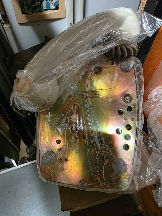 Receptor de telefone, antiga recepcionista - Cinza