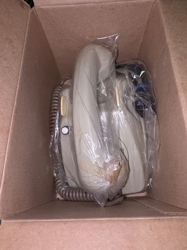 Receptor de telefone, antiga recepcionista - Cinza