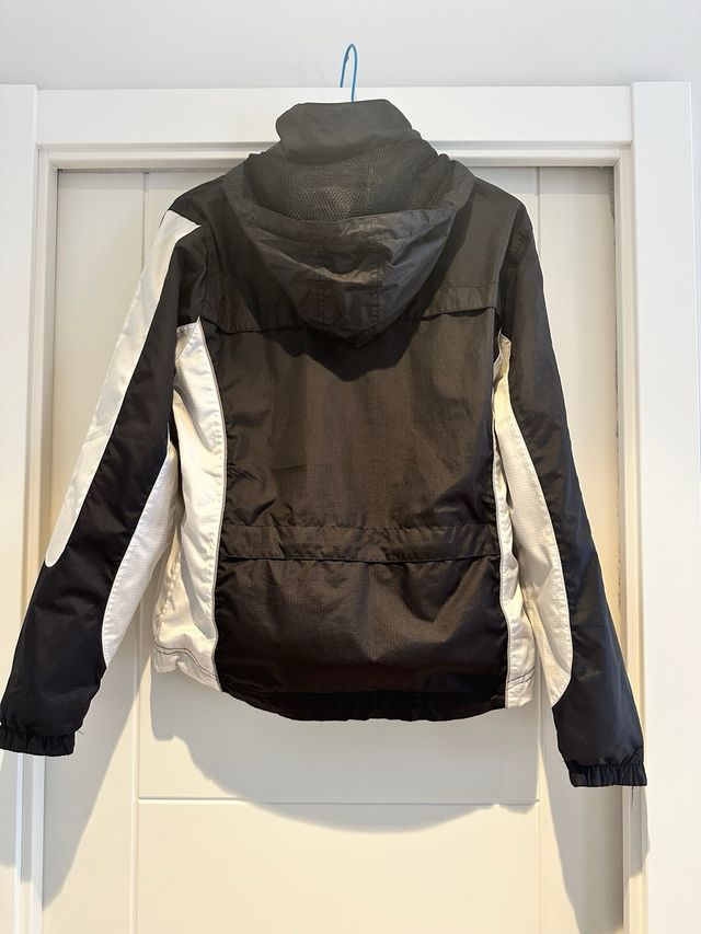 Chubasquero ciclismo mujer blanco-negro