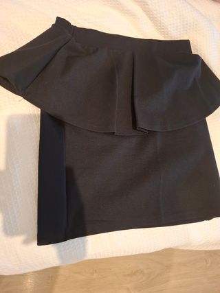 Falda negra mini tubo vuelo