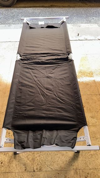 Cama plegable maximo 113Kgs. para camping , jardin