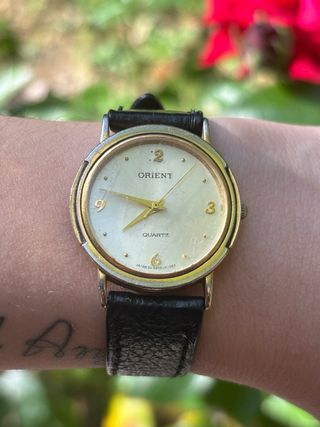 Reloj Orient cuarzo dorado