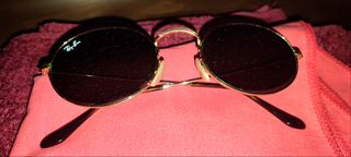 Ray Ban redondas doradas