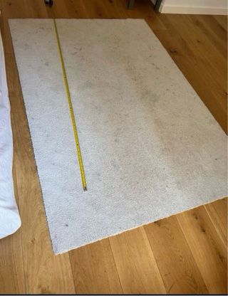 Alfombra blanca usada 135x197cm