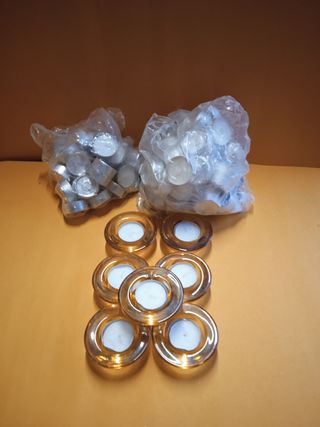 100 Candele tealight
7 portacandele vetro ambra 