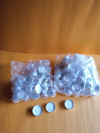 100 Candele tealight
7 portacandele vetro ambra 