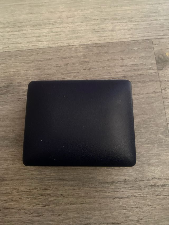 Gemelos y clip dorados