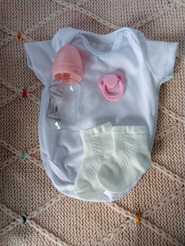 Muñeca reborn de piel oscura y pelo afro, rebajada