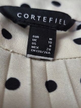 Falda plisada lunares Cortefiel beige-negro