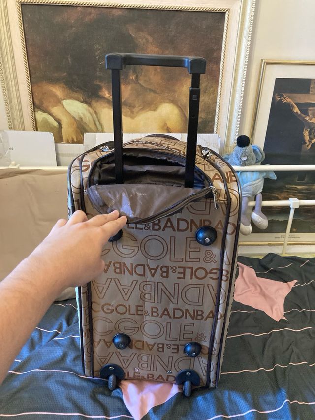 Bolsa de viaje beige y marrón