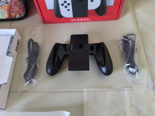 Custodia, scatola e accessori originali per Nintendo Switch