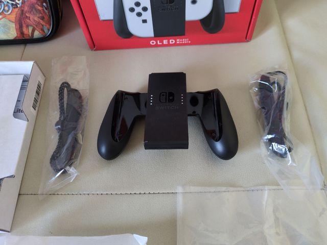 Funda Nintendo Swich original, caja y complementos