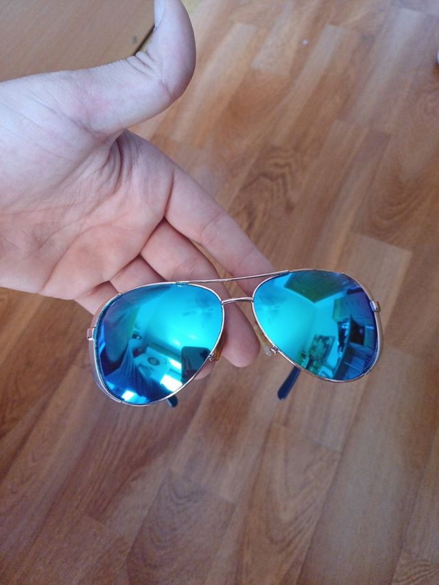 Gafas sol aviator doradas